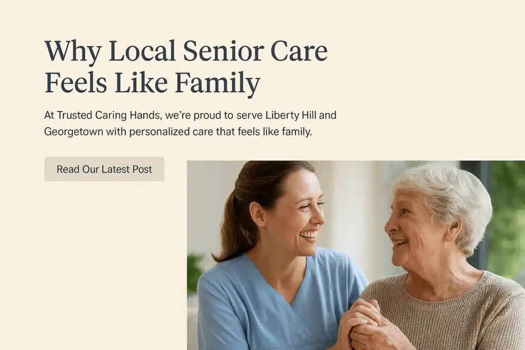 Caregiver in blue scrubs smiling and holding hands with an elderly woman in a beige sweater in a warm hero image about local senior care.